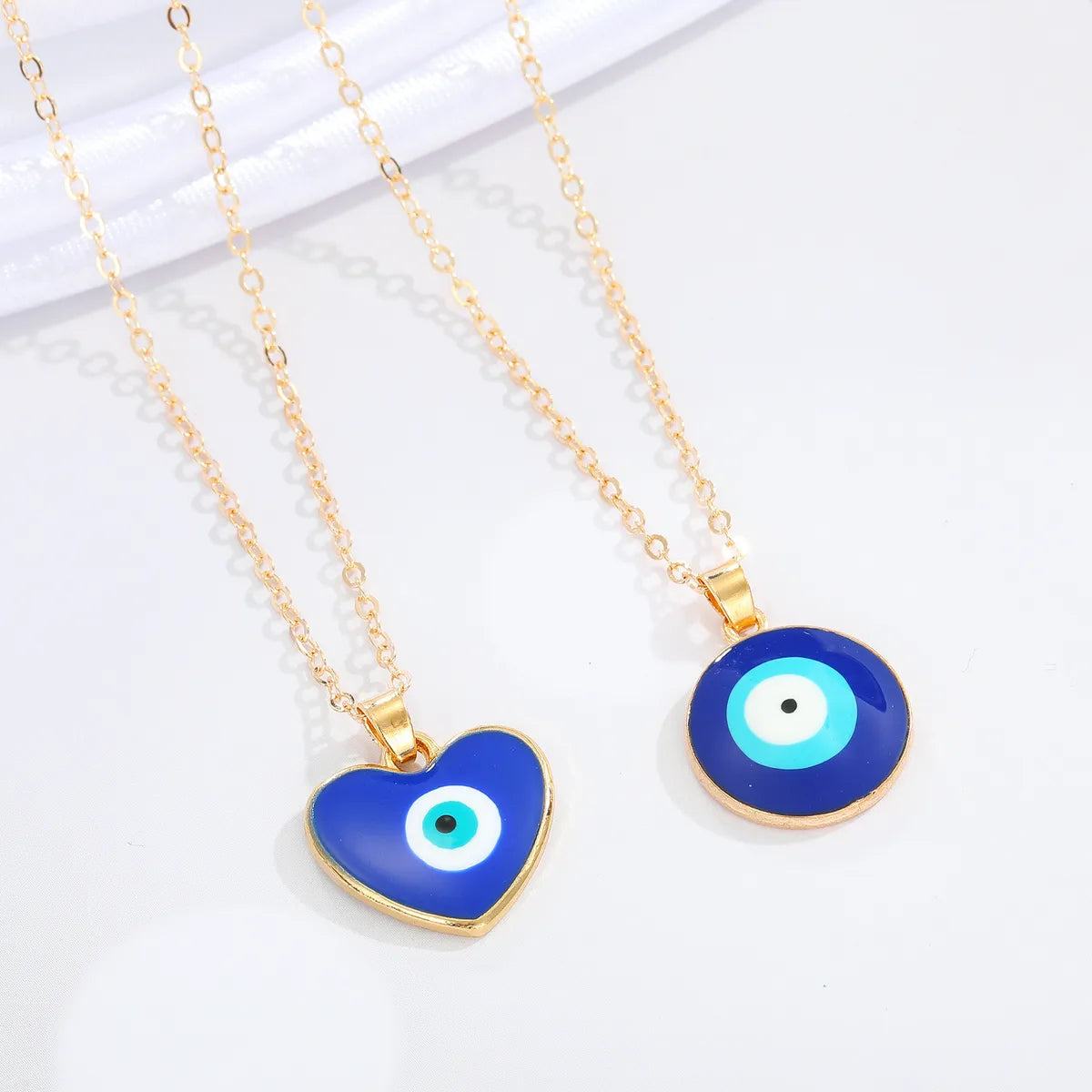 Fashion Peach Heart Round Devil's Eye Pendant Resin Necklace