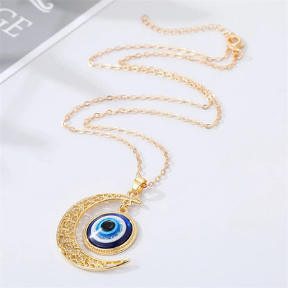 Fashion Retro Hollow Moon Blue Eye Alloy Necklace