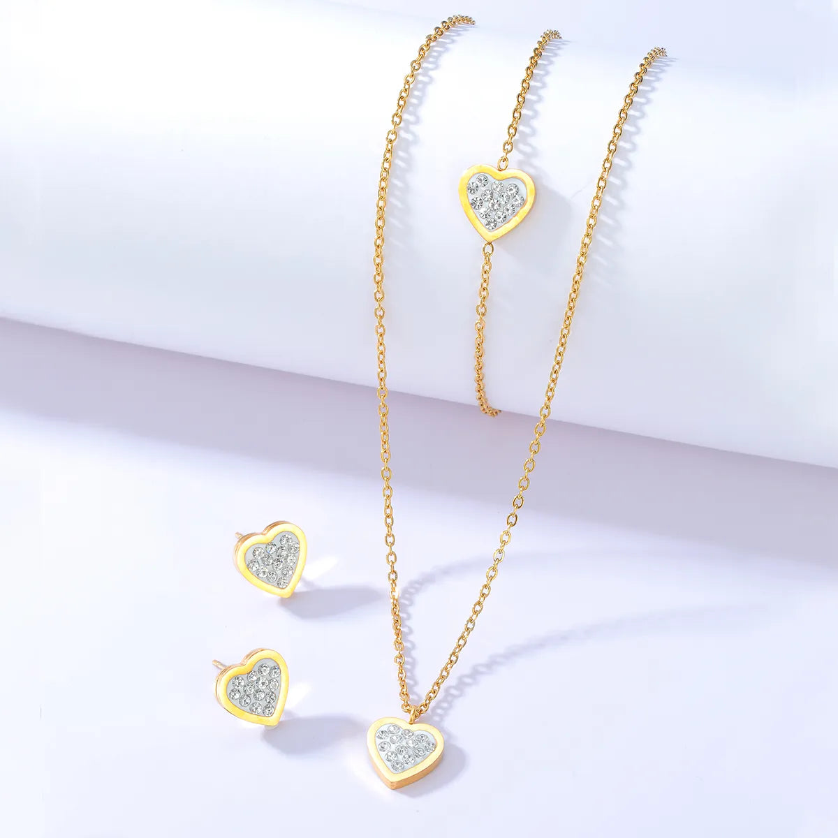 Fashion Simple Heart-shaped Zircon Stainless Steel Ear Stud Bracelet Necklace Set