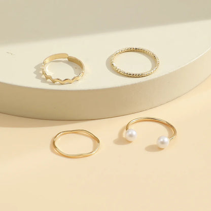 Fashion Simple Pearl Wave Twist Joint Alloy Ring Four-piece Set