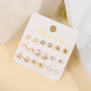 Fashion Sun Star Moon Alloy Inlay Artificial Pearls Rhinestones Women'S Ear Studs 1 Set