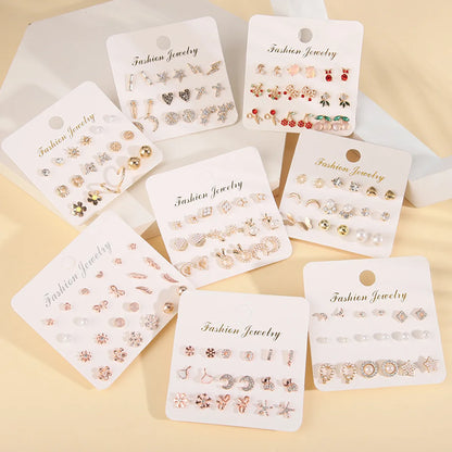 Fashion Sun Star Moon Alloy Inlay Artificial Pearls Rhinestones Women'S Ear Studs 1 Set