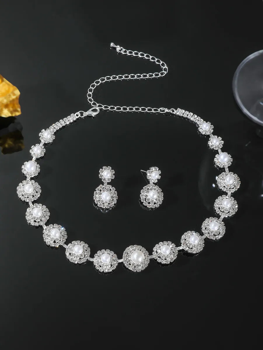 Formal Shiny Round Artificial Crystal Rhinestone Plating Inlay Rhinestones Silver Plated Women'S Earrings Necklace