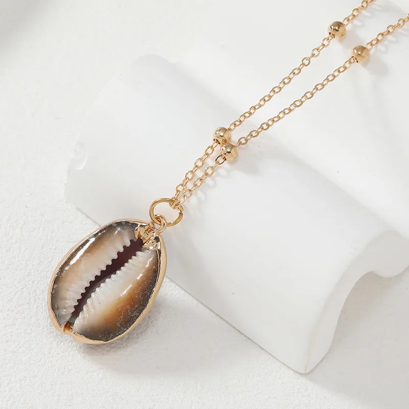 Glam Lady Beach Shell Alloy Gold Plated Women'S Pendant Necklace