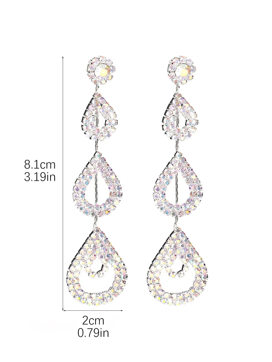 Glam Shiny Water Droplets Rhinestone Plating Hollow Out Inlay Rhinestones Silver Plated Women'S Drop Earrings