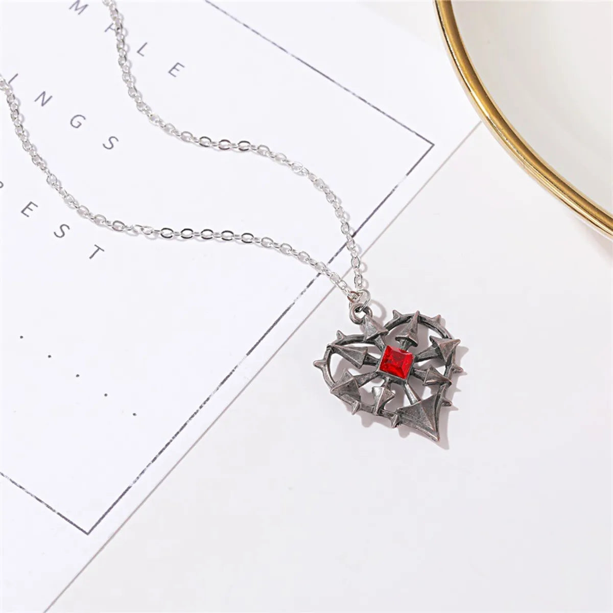 Gothic Heart Shape Alloy Hollow Out Artificial Gemstones Women'S Pendant Necklace