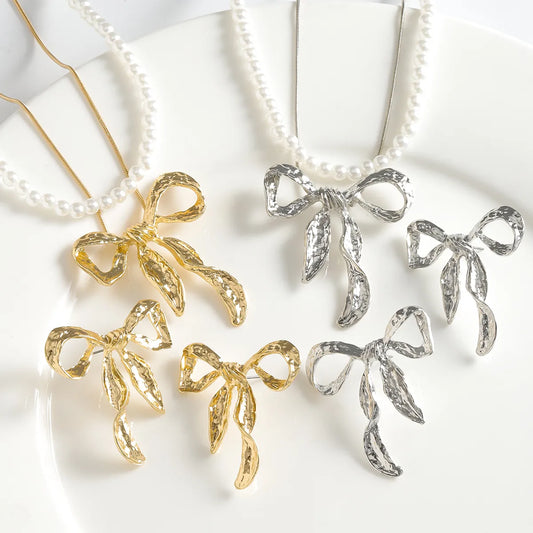 Hawaiian Simple Style Classic Style Bow Knot Alloy Polishing Plating K Gold Plated Women'S Jewelry Set