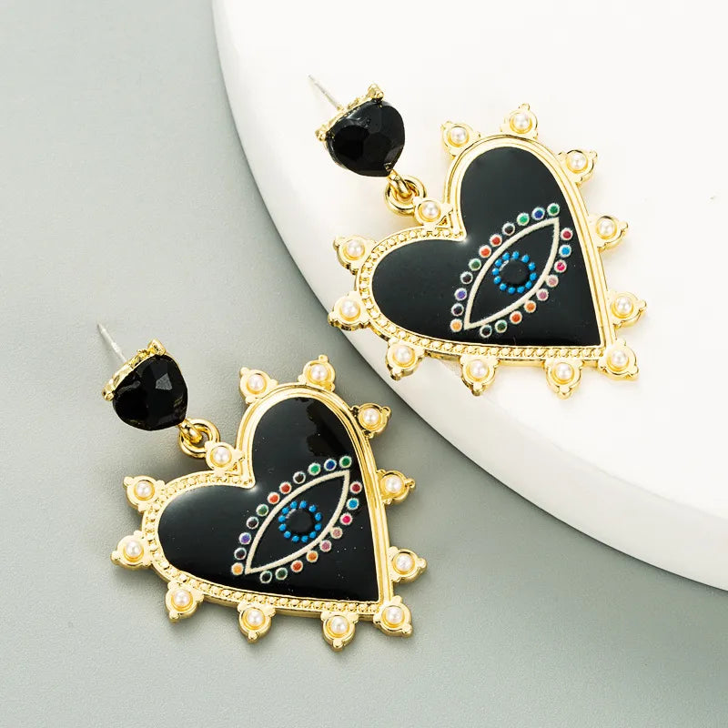 Heart-Shaped Devil'S Eyes Pearl Alloy Earrings