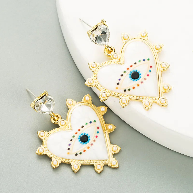 Heart-Shaped Devil'S Eyes Pearl Alloy Earrings