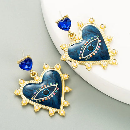 Heart-Shaped Devil'S Eyes Pearl Alloy Earrings