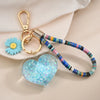 Heart-Shaped Sequins Quicksand Flower Pendant Keychain Wholesale Nihaojewelry