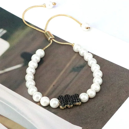 Hip-Hop Bear Eye Artificial Pearl Copper Plating Zircon Gold Plated Women'S Drawstring Bracelets