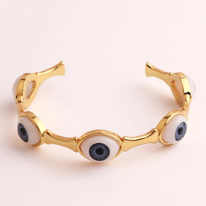 Hip-hop Devil's Eye Copper Gold Plated Bangle