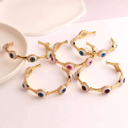 Hip-hop Devil's Eye Copper Gold Plated Bangle