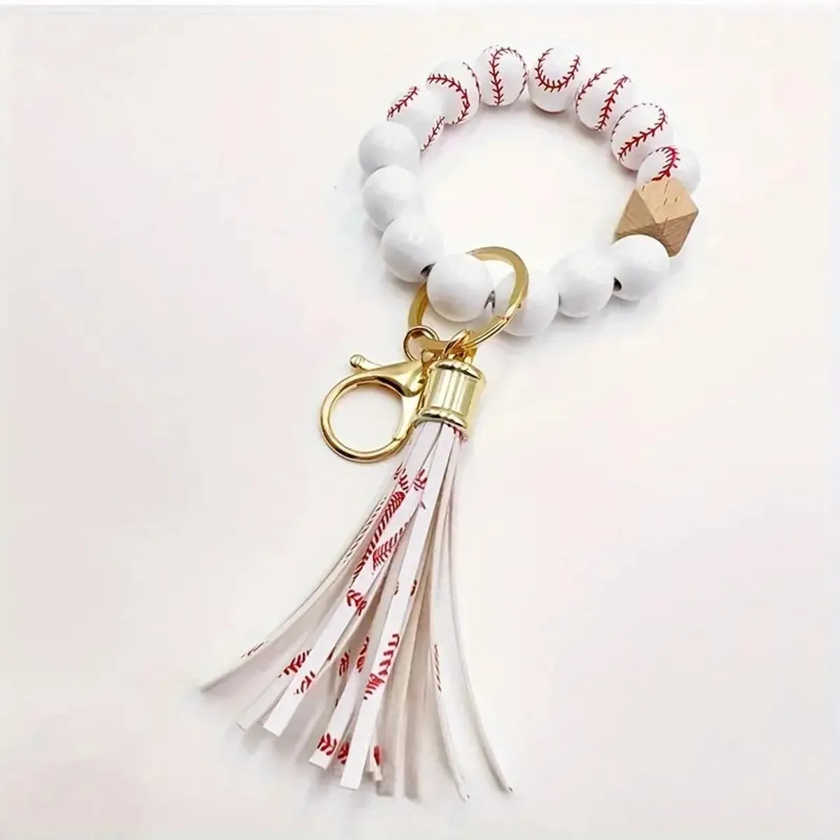 IG Style Casual Sports Tassel Ball Pu Leather Wooden Beads Metal Beaded Printing Bag Pendant Keychain