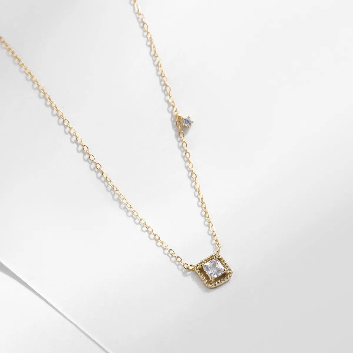 Ig Style Commute Square Sterling Silver Rhodium Plated Zircon Necklace In Bulk