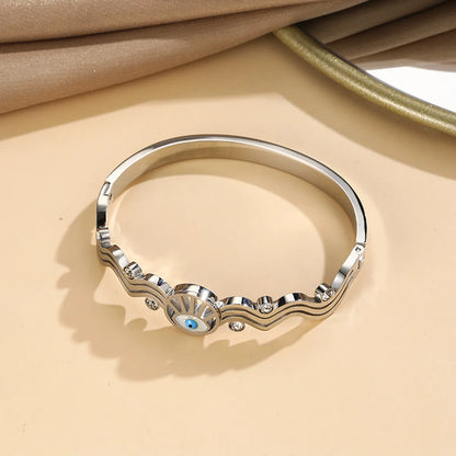 Ig Style Cool Style Devil's Eye Titanium Steel Plating Hollow Out Inlay Shell Zircon Bangle