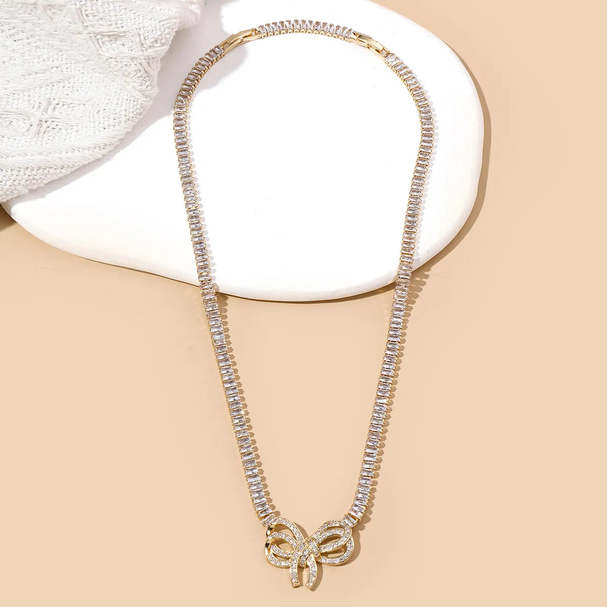 Ig Style Flower Bow Knot Copper 18k Gold Plated Zircon Pendant Necklace In Bulk