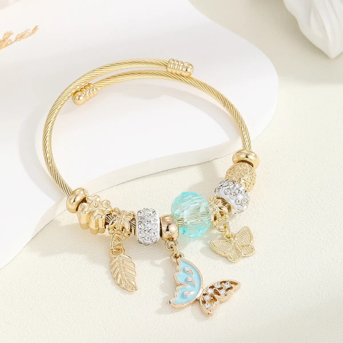 IG Style Modern Style Classic Style Devil'S Eye Bear Butterfly Gold Plated Rhinestones Glass Pearl 304 Stainless Steel Alloy Wholesale Bangle