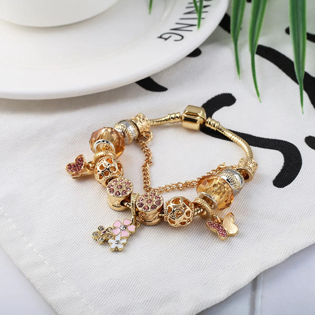 Ig Style Sweet Heart Shape Flower Butterfly Alloy Plating Inlay Artificial Crystal Rhinestones Women'S Bracelets