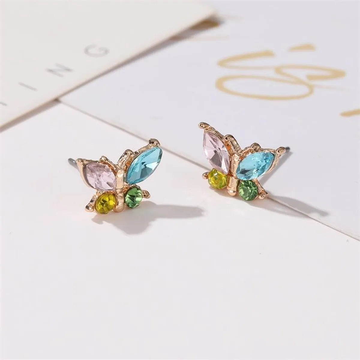 Simple Style Butterfly Plating Alloy Artificial Gemstones Earrings Ear Studs