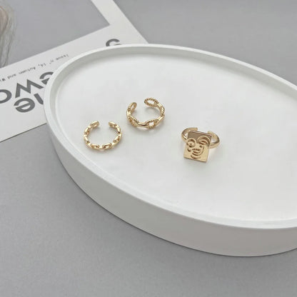 Korean Golden Smile Face Twist Woven Ring