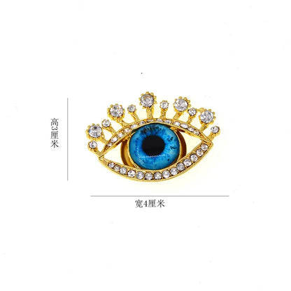 Korean Style Eye Alloy Plating Inlay Artificial Gemstones Women'S Brooches