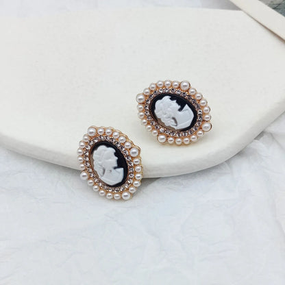 Luxurious Portrait Alloy Inlay Artificial Pearls Ear Studs