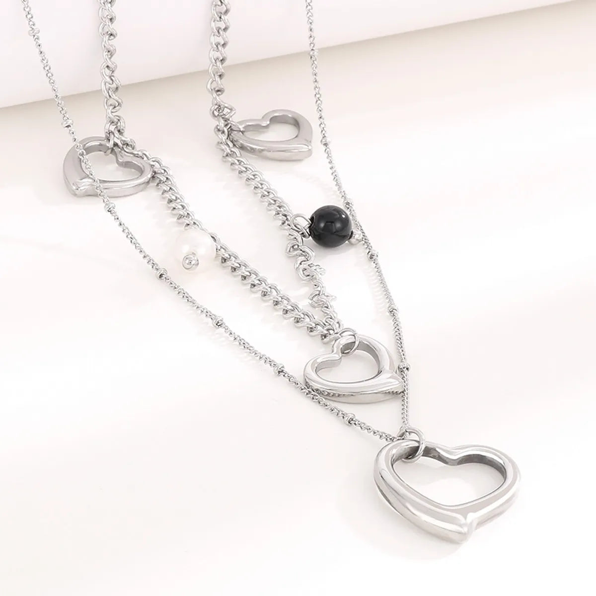 Modern Style Cool Style Heart Shape Stainless Steel Titanium Steel Pearl Plating Hollow Out Layered Necklaces