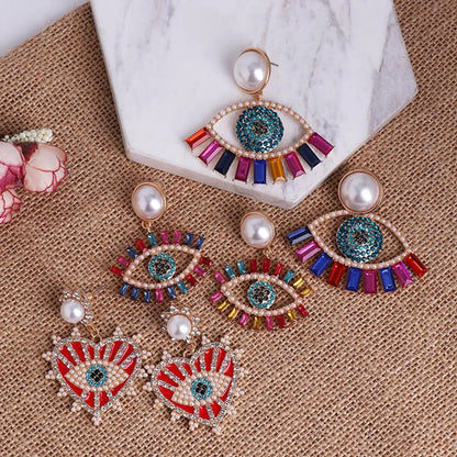 Fashion Eye Diamond Alloy Acrylic Earrings Ear Studs