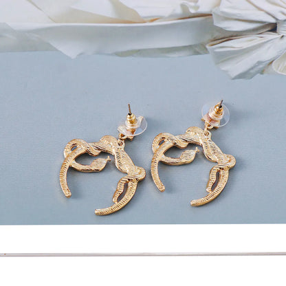 New Retro Exaggerated Coiled Snake Shape Alloy Diamond Earrings