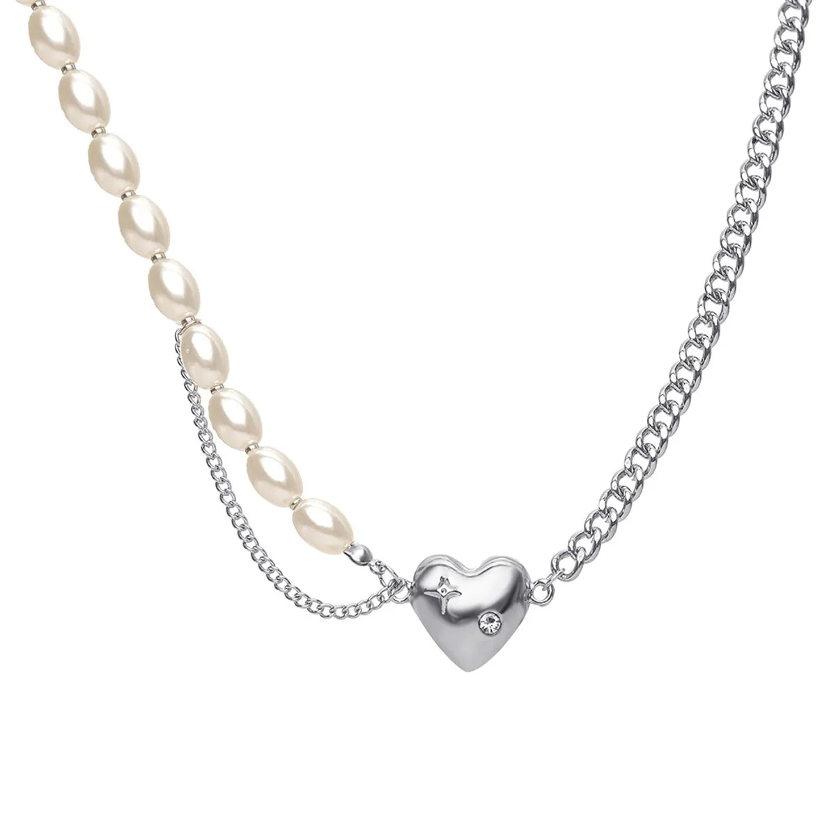 New Retro Pearl Simple Stitching Pearl Chain Heart Pendant Necklace