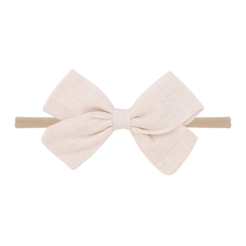 Nihaojewelry Cute Children'S Cotton And Linen Fabric Bow Hair Band Wholesale Jewelry