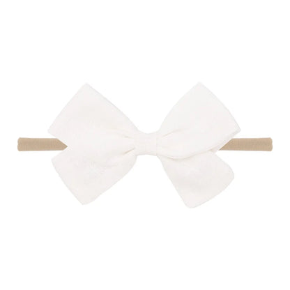 Nihaojewelry Cute Children'S Cotton And Linen Fabric Bow Hair Band Wholesale Jewelry