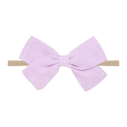 Nihaojewelry Cute Children'S Cotton And Linen Fabric Bow Hair Band Wholesale Jewelry