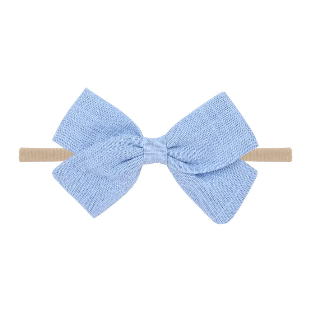 Nihaojewelry Cute Children'S Cotton And Linen Fabric Bow Hair Band Wholesale Jewelry