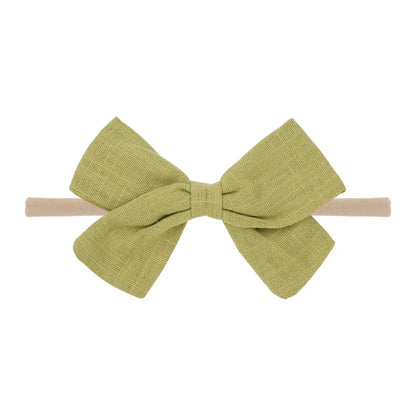 Nihaojewelry Cute Children'S Cotton And Linen Fabric Bow Hair Band Wholesale Jewelry