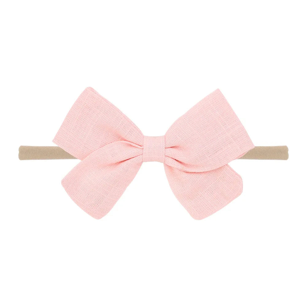 Nihaojewelry Cute Children'S Cotton And Linen Fabric Bow Hair Band Wholesale Jewelry