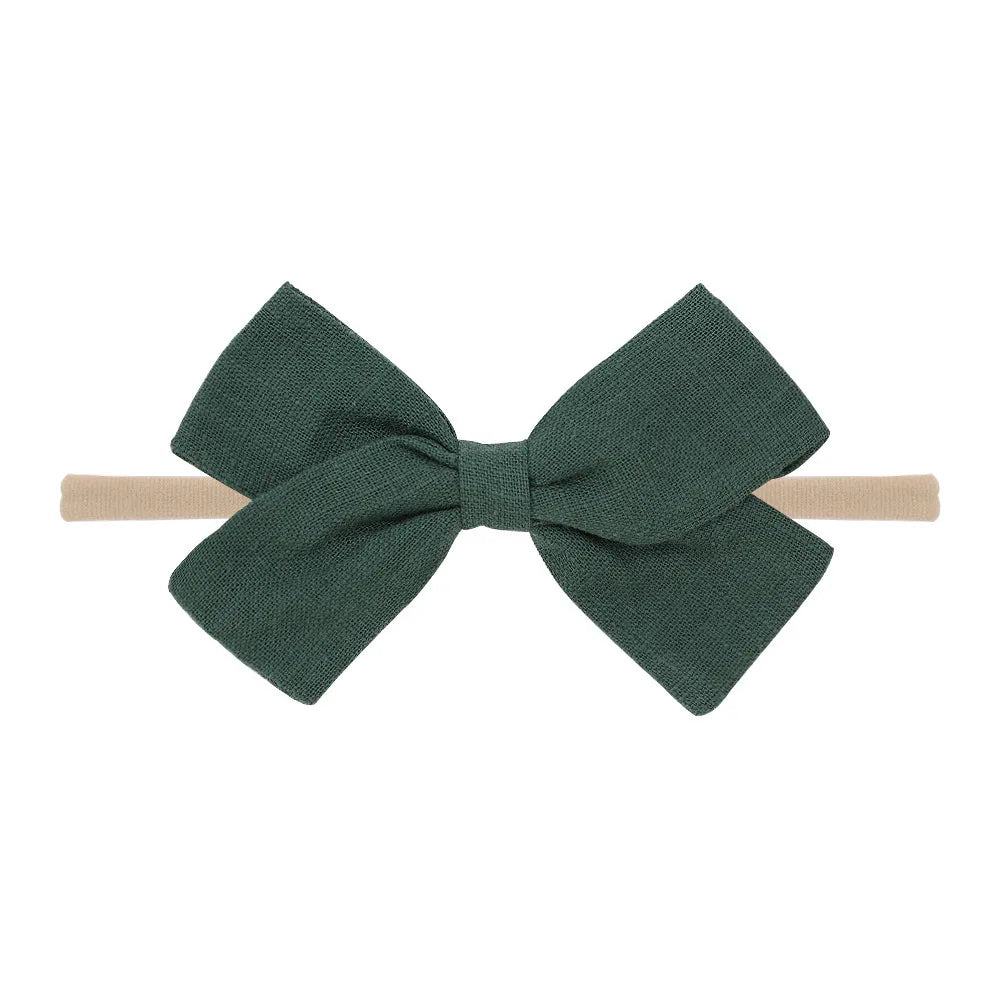 Nihaojewelry Cute Children'S Cotton And Linen Fabric Bow Hair Band Wholesale Jewelry