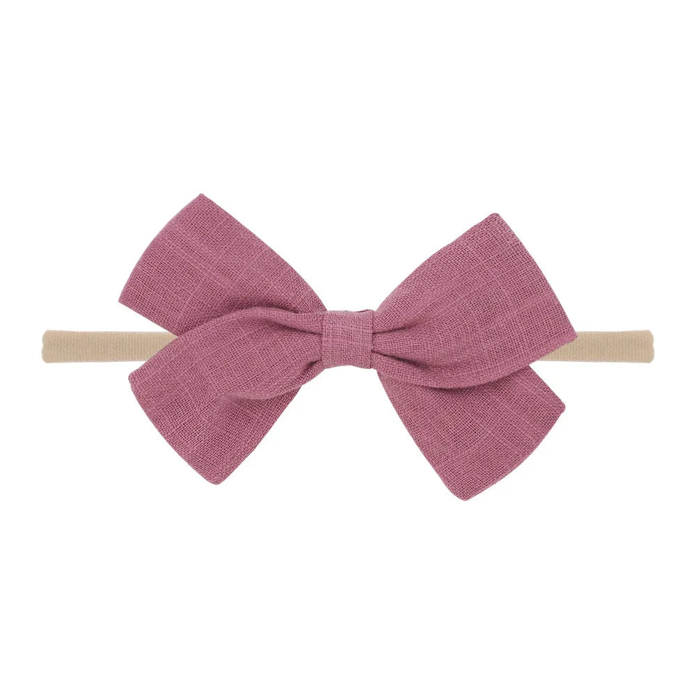 Nihaojewelry Cute Children'S Cotton And Linen Fabric Bow Hair Band Wholesale Jewelry