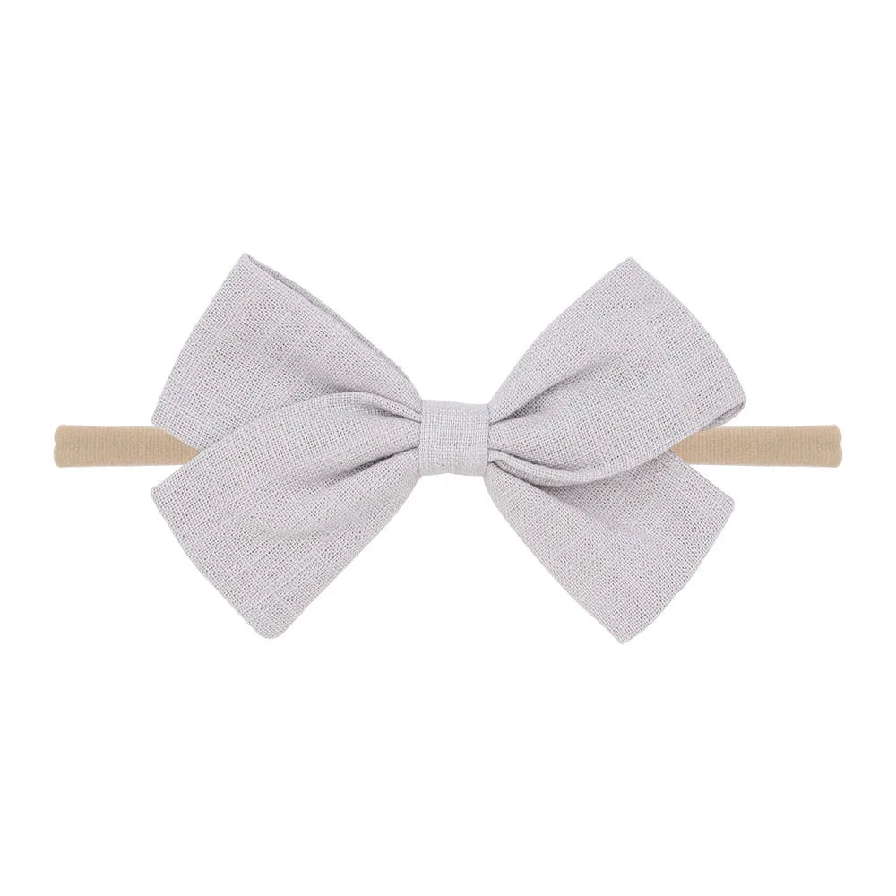 Nihaojewelry Cute Children'S Cotton And Linen Fabric Bow Hair Band Wholesale Jewelry