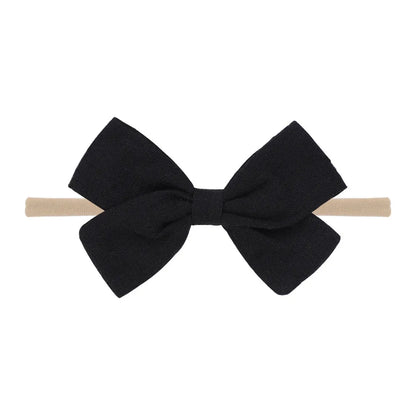 Nihaojewelry Cute Children'S Cotton And Linen Fabric Bow Hair Band Wholesale Jewelry