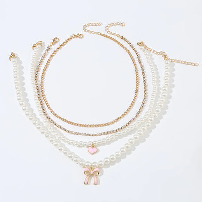 Princess Sweet Heart Shape Bow Knot Artificial Pearl Alloy Beaded Plating Inlay Rhinestones Girl'S Necklace