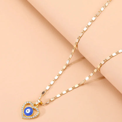 Retro Devil'S Eye Heart Alloy Epoxy Plating Inlay Artificial Diamond Necklace