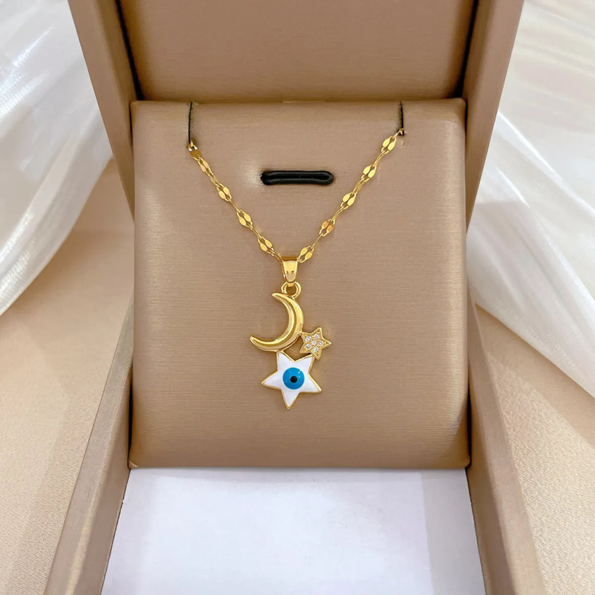 Wholesale Retro Devil'S Eye Star Moon Titanium Steel Copper Inlay Zircon Pendant Necklace