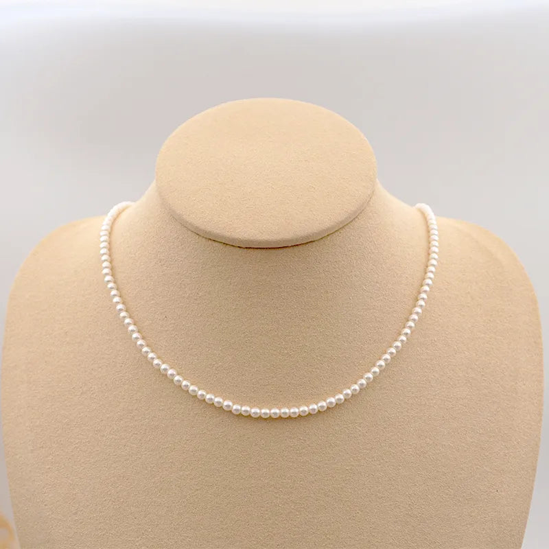 Retro Handmade Solid Color 304 Stainless Steel Imitation Pearl Titanium Steel Beaded Plating Gold Plated Women'S Necklace