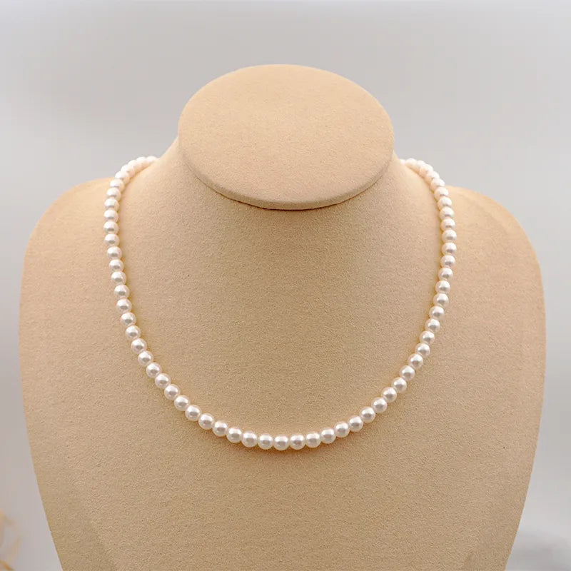 Retro Handmade Solid Color 304 Stainless Steel Imitation Pearl Titanium Steel Beaded Plating Gold Plated Women'S Necklace