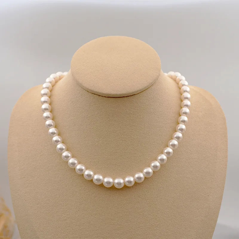 Retro Handmade Solid Color 304 Stainless Steel Imitation Pearl Titanium Steel Beaded Plating Gold Plated Women'S Necklace