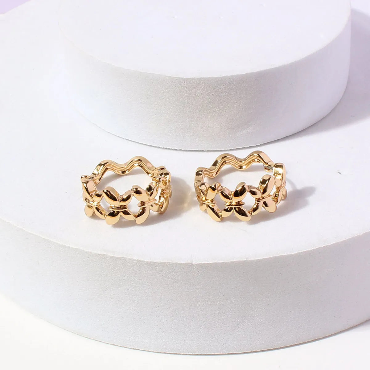 Retro Solied Color Butterfly Shaped Hollowed Alloy Hoop Earrings Wholesale