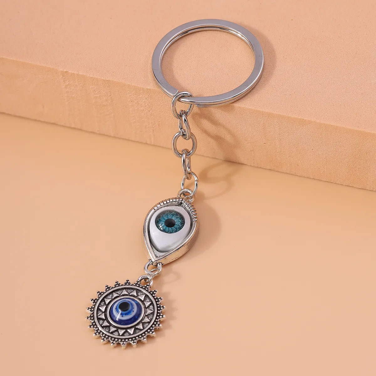 Retro Sun Eye Alloy Bag Pendant Keychain